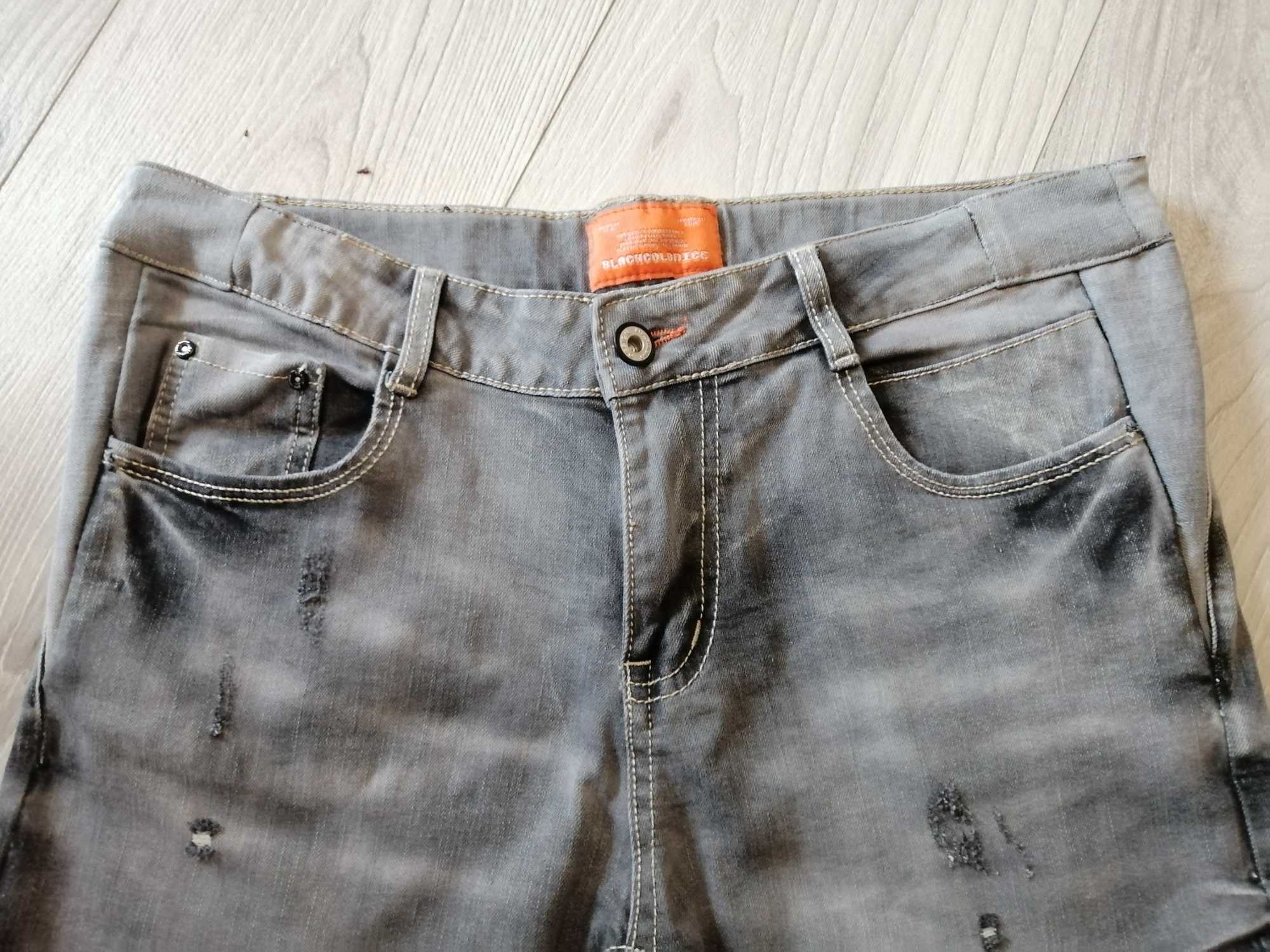 spodnie jeansowe firmy BlackColonice dla chłopca w rozmiarze 158/164