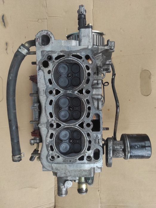 ГБЦ головка блока Toyota Duet 1.0i12v Daihatsu Materia,Xenia Sirion