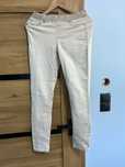 Sposnie kremowe leginsy r 36