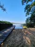 Pokoje nad jeziorem w Gibach/pole namiotowe/własna plaża
