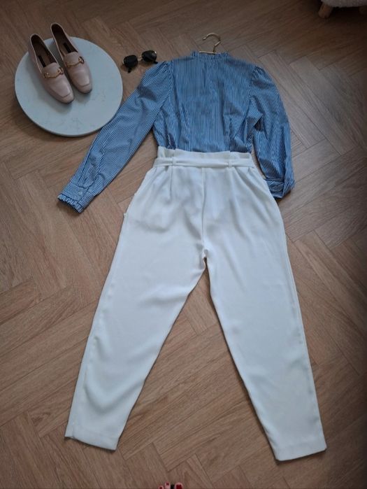 Chinosy śmetankowe roz.40