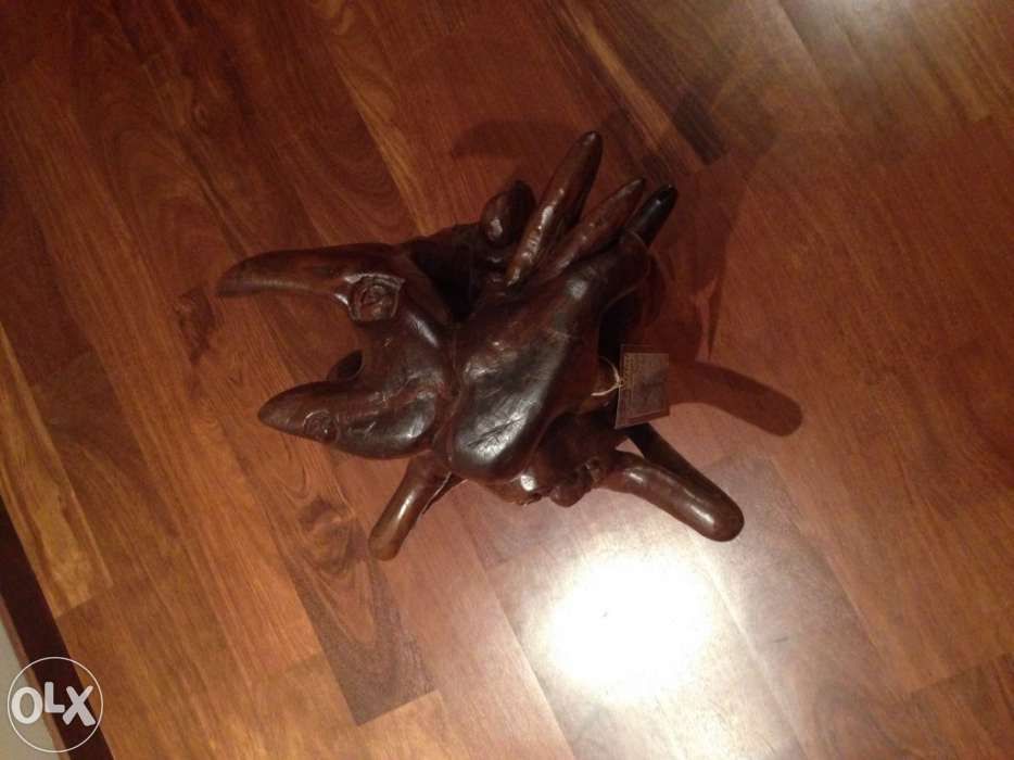 Escultura em madeira naftal langa