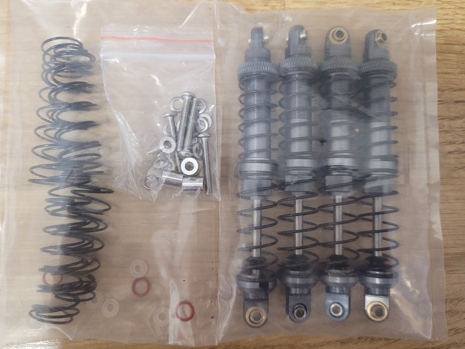 4 amortyzatory olejowe 100mm 4 szt. modelarskie RC zapasowe oringi spr