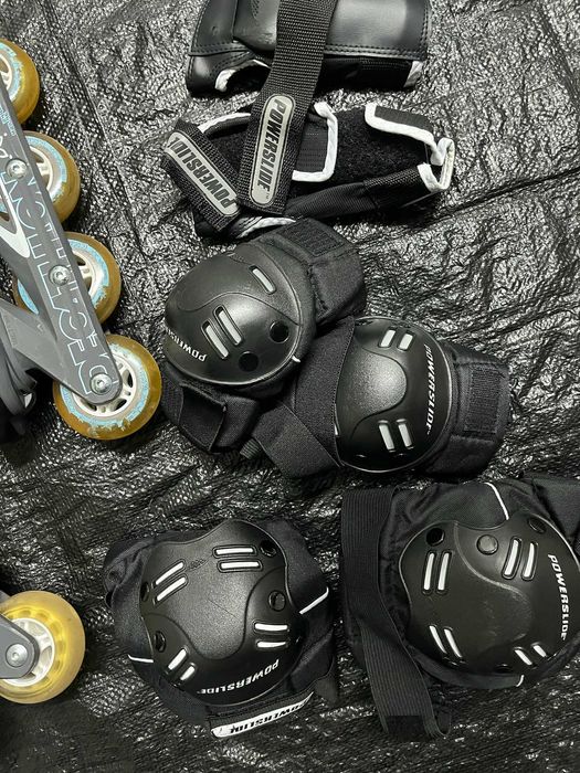 Patins em linha, com proteções e saco para patins