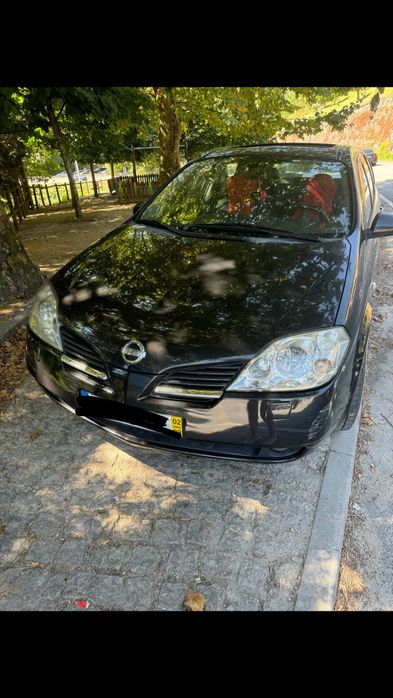 Vendo ou troco nissan primera 2002