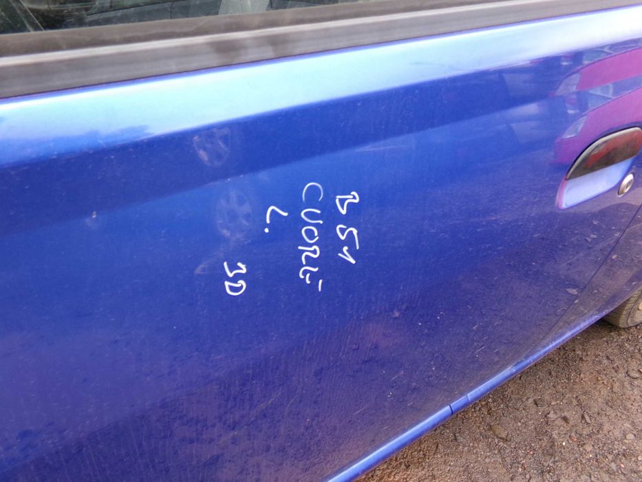 Sie55 Drzwi lewe daihatsu cuore VI 851 3D wysyłka części