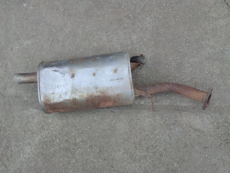 Продам выхлопную систему Мицубиси ланцер.