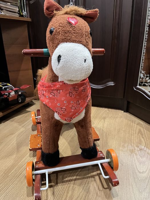 Конячка - гойдалка.