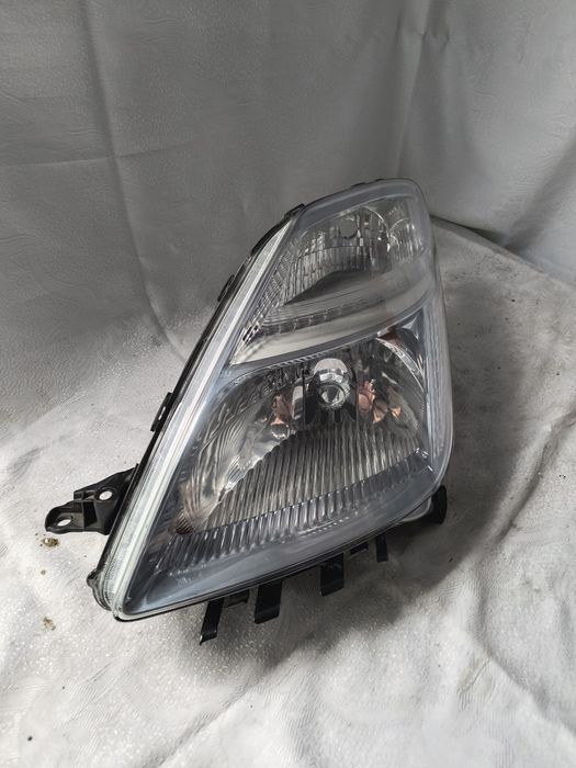 Lampa lewa Toyota Prius II 2 EUROPA reflektor przedni