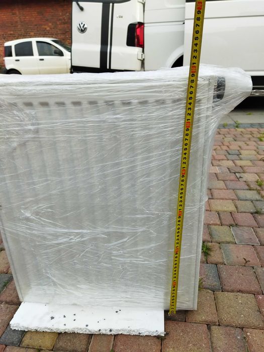 Dwa grzejniki (50cm i 60cm) z termostatami