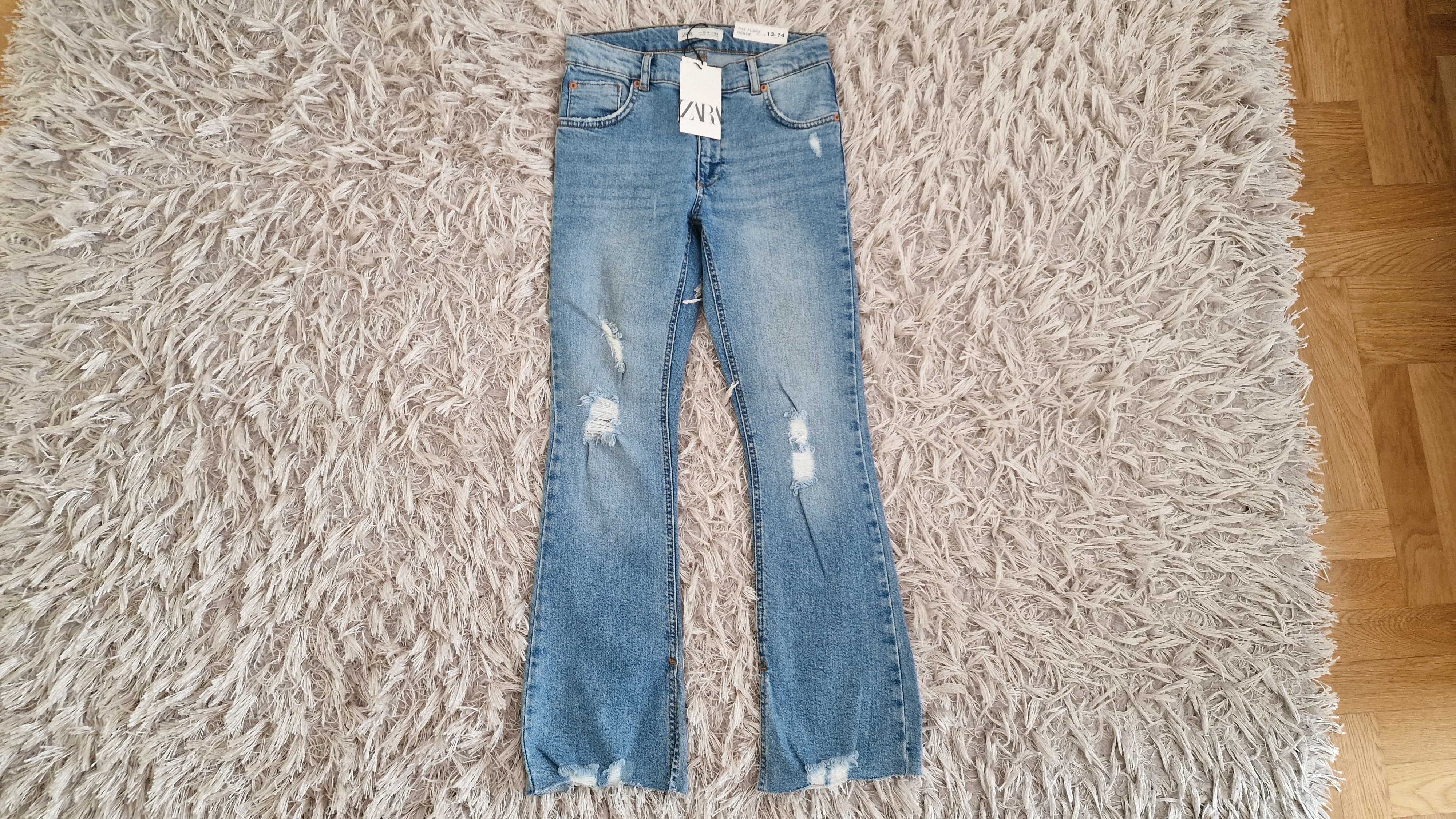 Zara spodnie jeansy flare z przetarciami / rozdarciami 164 cm zara