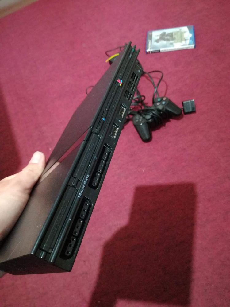 Konsola PlayStation 2 Slim z kierownicą i grami