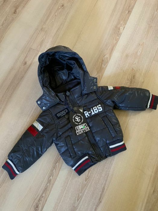 Куртка для хлопчика на пуху нова  на 12 міс