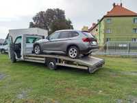 Auto laweta Transport Autolaweta holowanie pojazdów Pomoc Drogowa