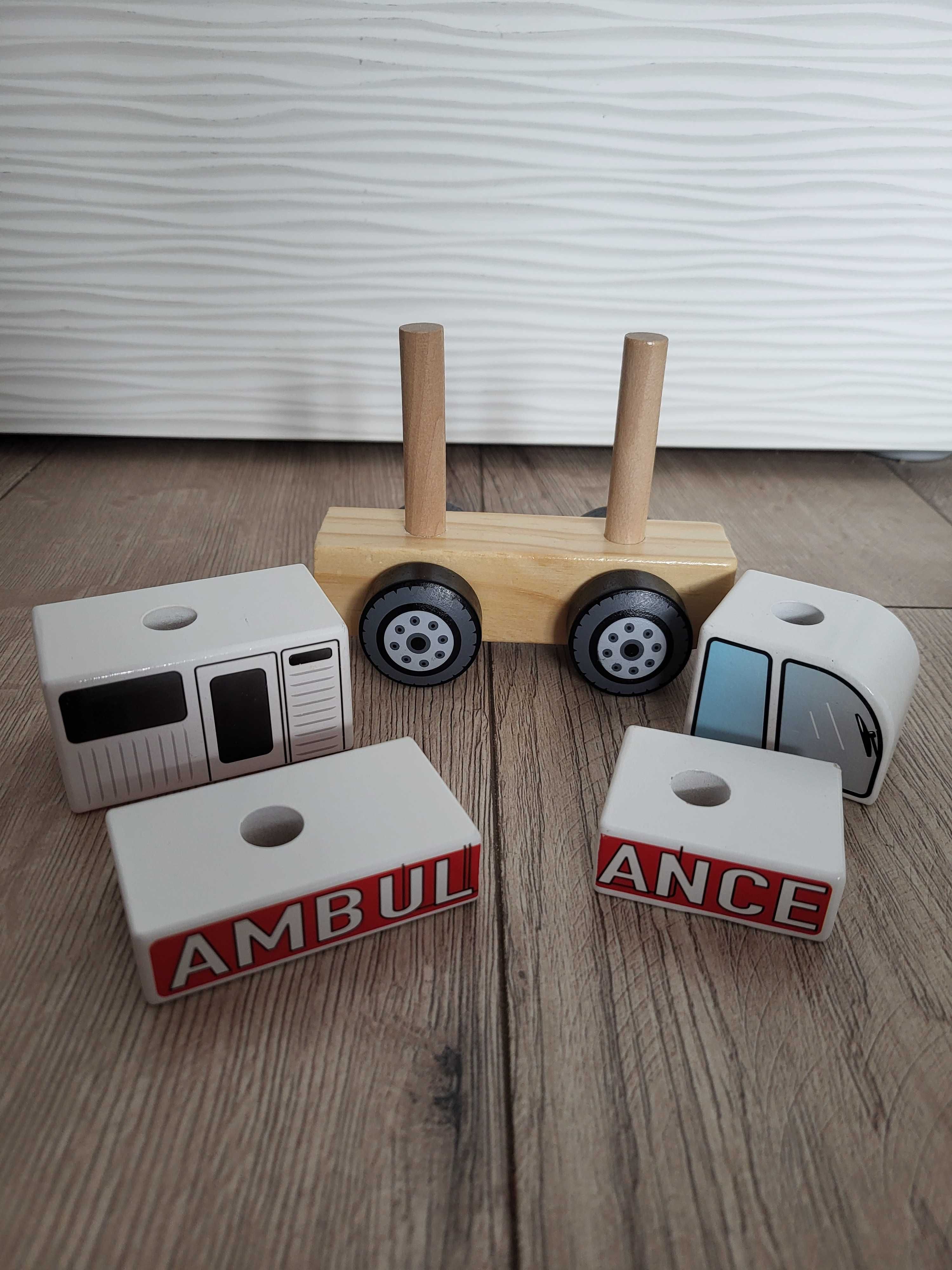 Drewniany ambulans Trefl, zabawka karetka, pojazd, autko