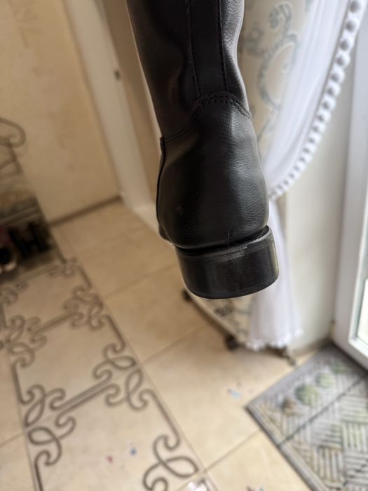 Високі осінні сапоги