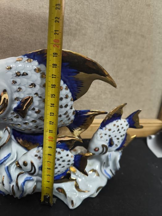 Escultura Peixes Porcelana Azul Ouro
Majestosa e vibrante figura decor