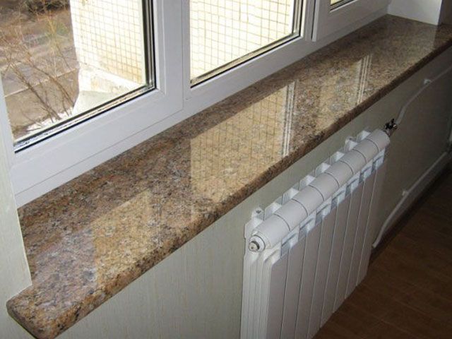 Столи підвіконня фасади сходи стільниці та інше з граніту