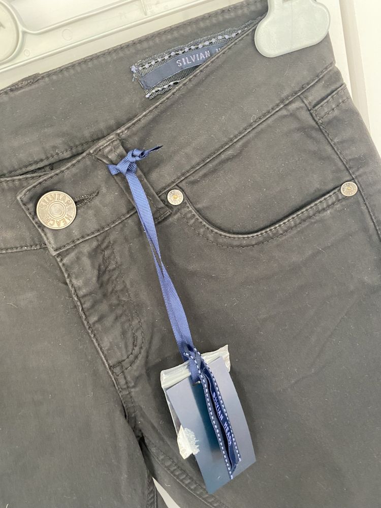 Silvian Heach włoskie czarne spodnie jeansy jeans rozszerzane dzwony