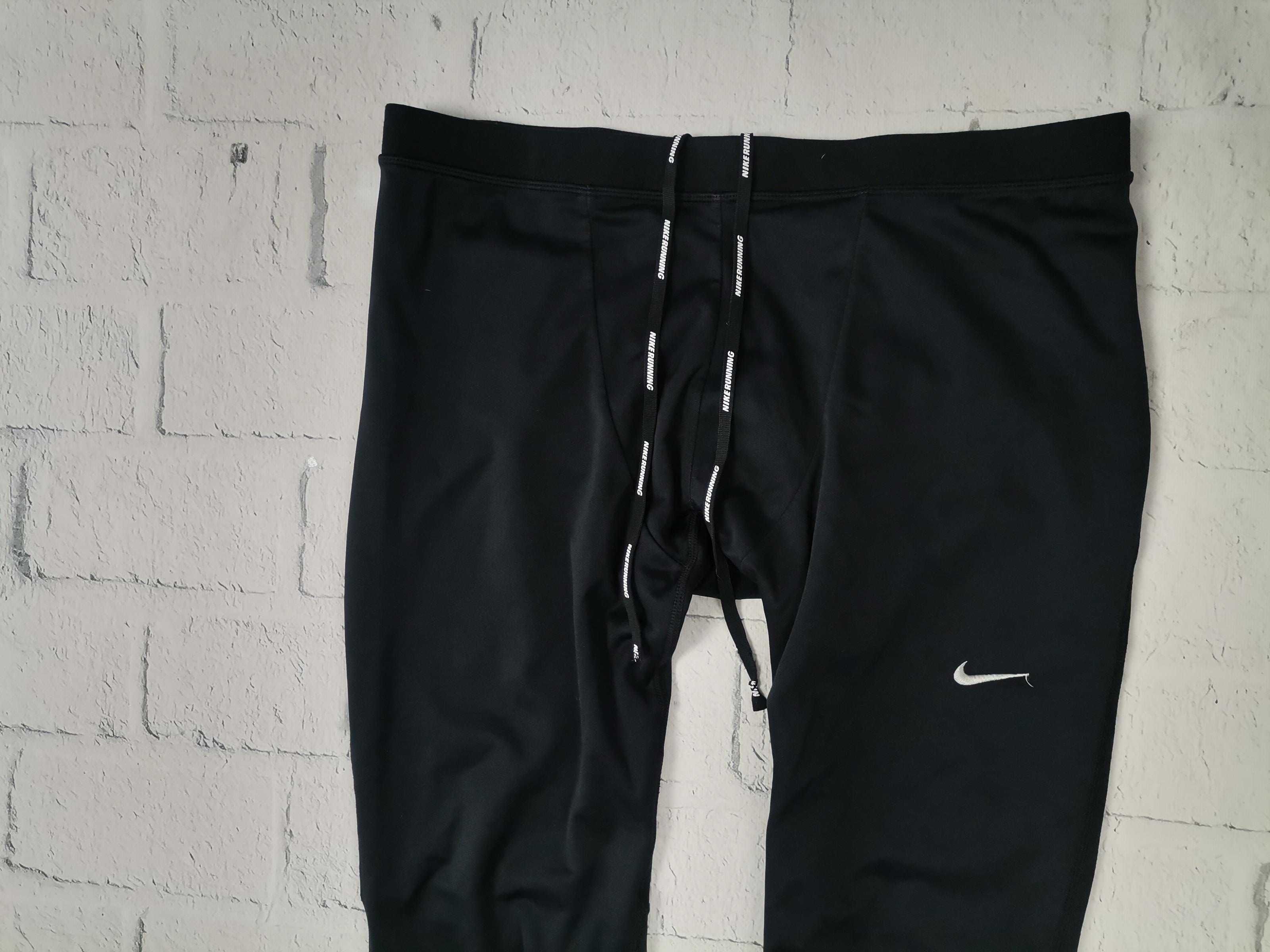 NIKE Running Tights Element Legginsy Getry Spodnie Męskie L Igła