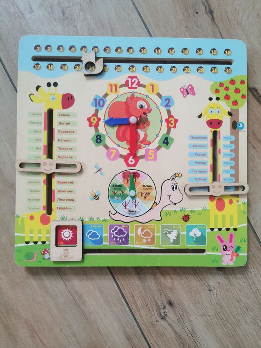 Дерев'яна іграшка для малюків. Розвиваючі годинник і календар природи