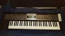 Roland E-09 + Tripé