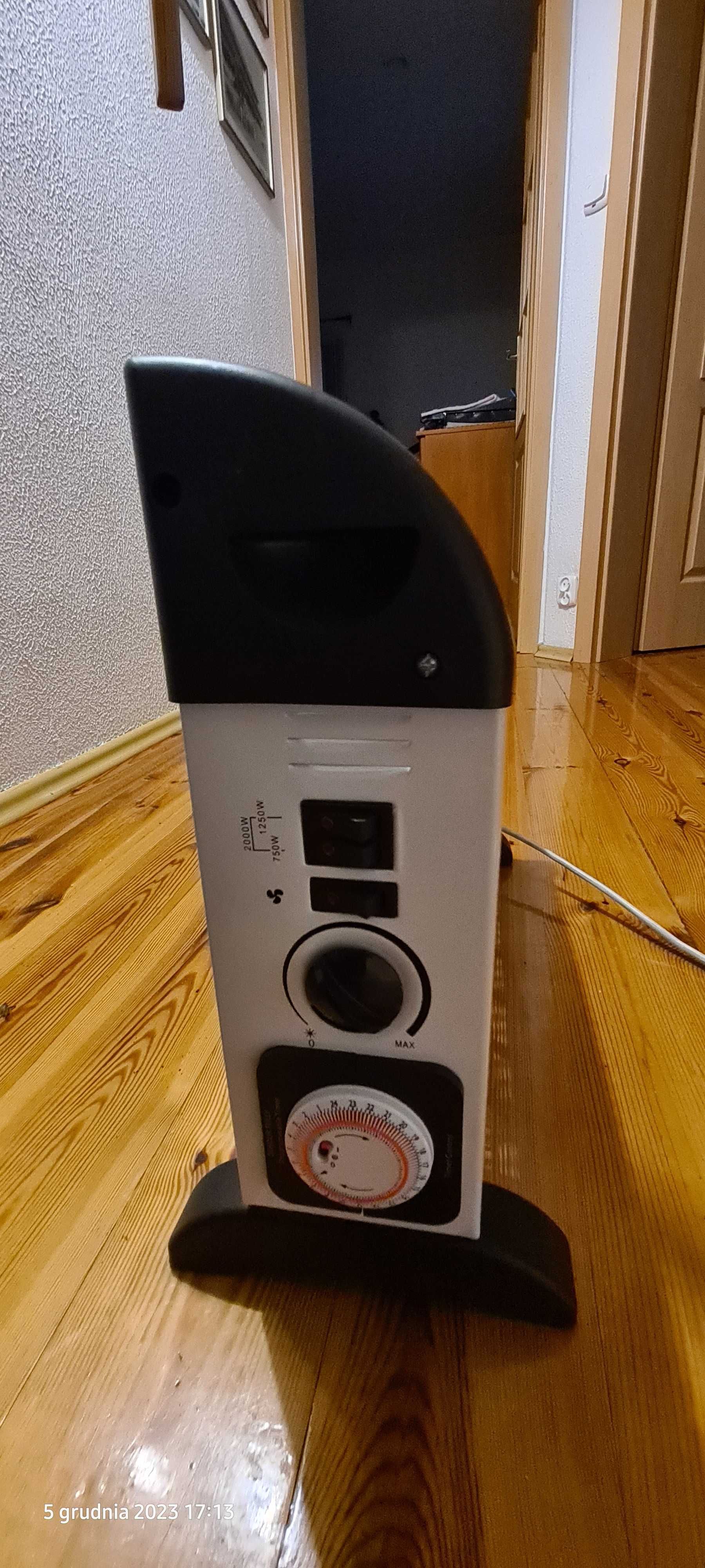 Nagrzewnica Trotec TCM 22 E  o mocy do 2000W wraz z regulacją czasową.