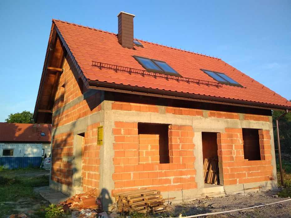Montaż płotków przeciwśniegowych śniegołapów drabinek zabezpieczeń