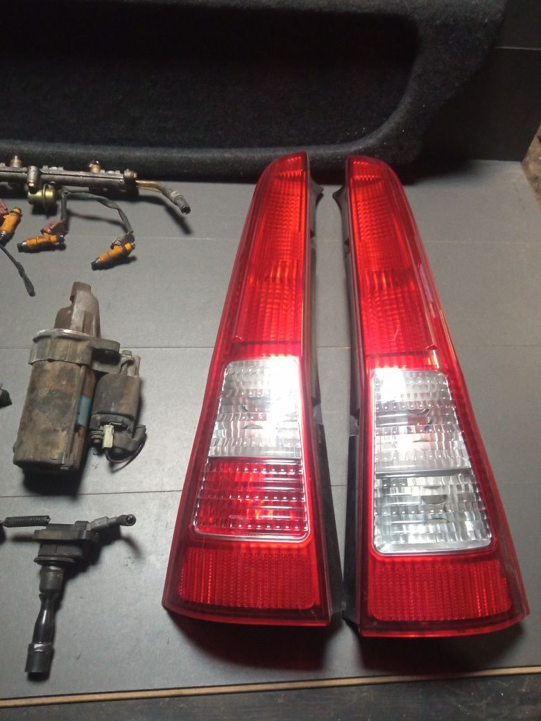 Daihatsu cuore II alternator rozrusznik lampy lusterka cewki wtryski