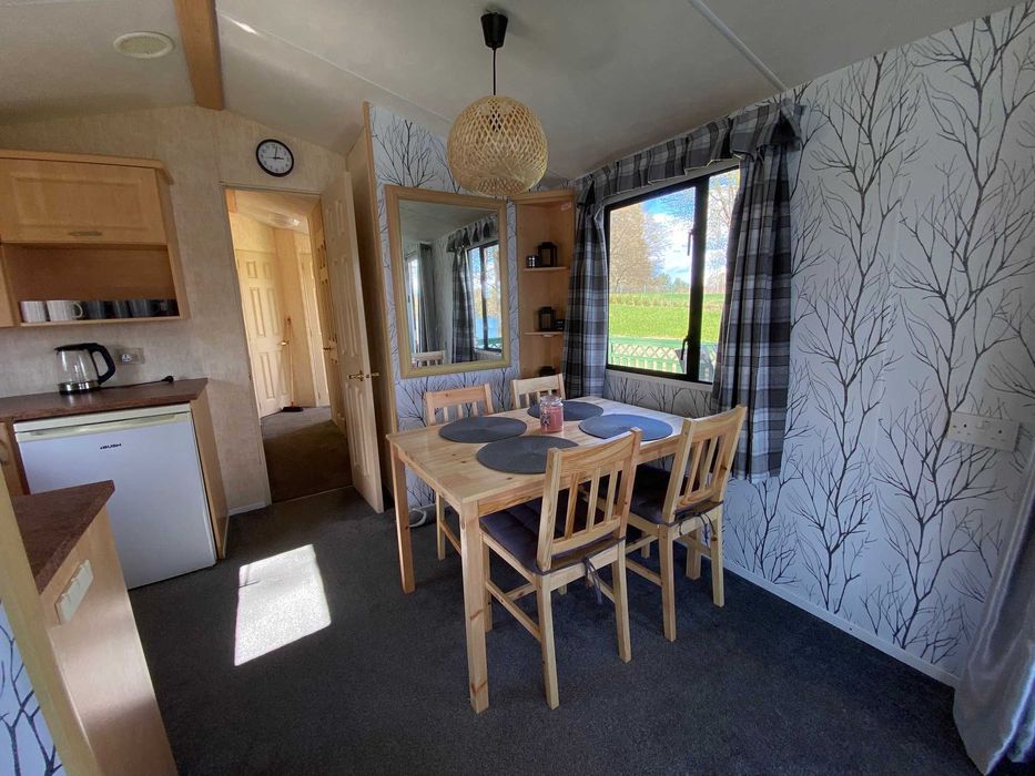 Domek nad jeziorem Ublik Wyszowate linia brzegowa pomost łódka