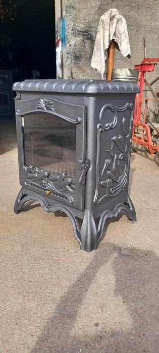 Vendo salamandra muito antiga em ferro  fundido