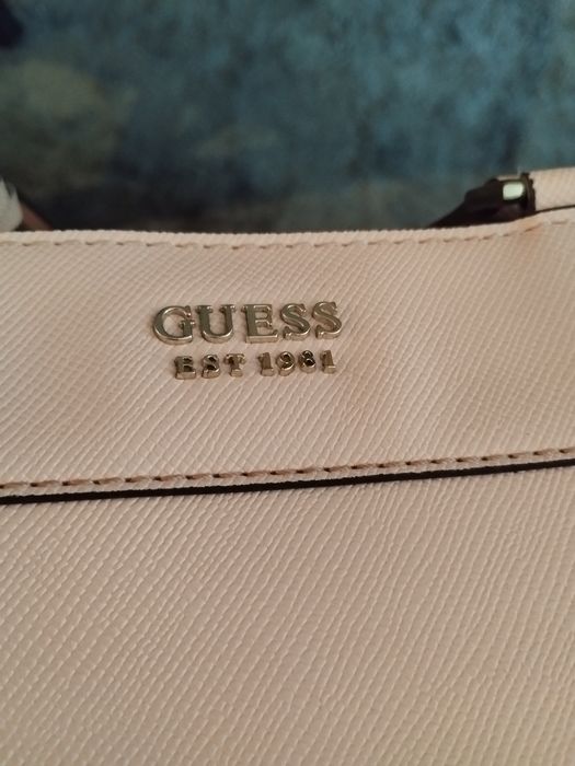 Mala Guess rosa claro