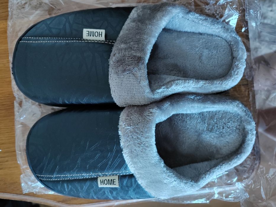 Продам мужские теплые тапочки размер на  42-43.
