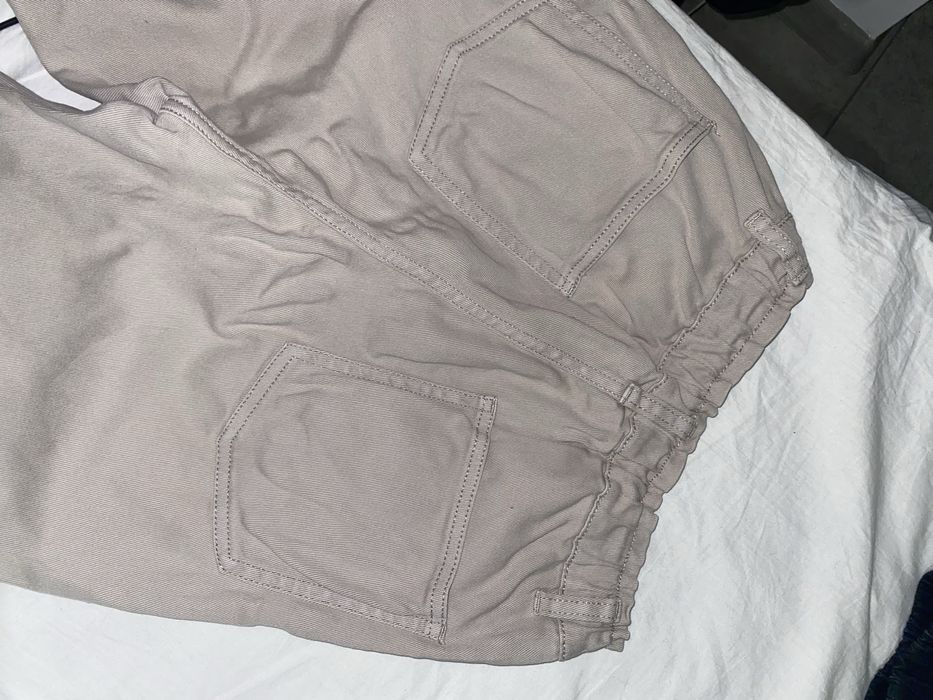 Бежеві джинсові штани