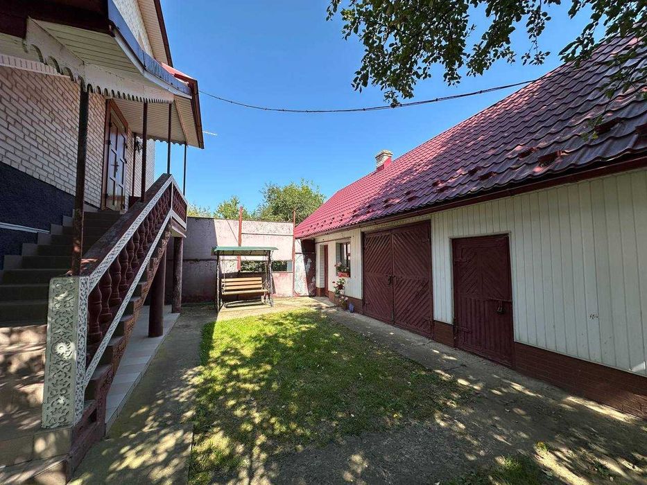 Продаж 2 пов будинку з 2 гаражеми і ділянкою на 12 соток, 236.5 кв.