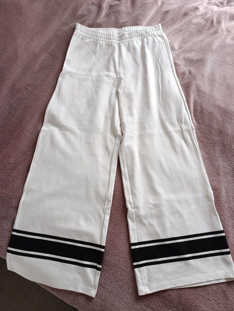 Reserved rozmiar L/XL 40/42 białe spodnie dresowe szerokie