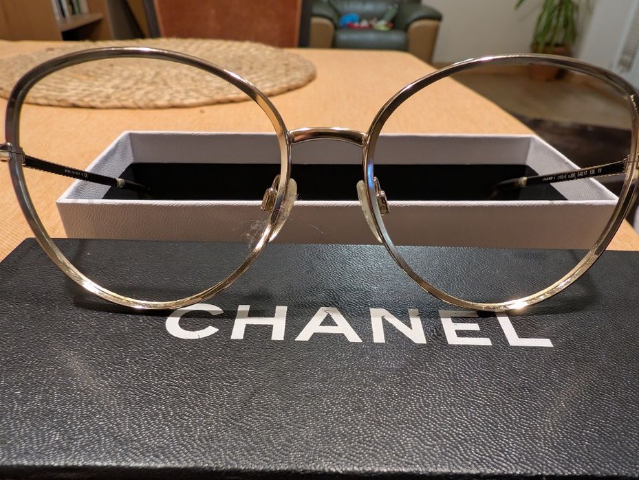Chanel złote oprawki