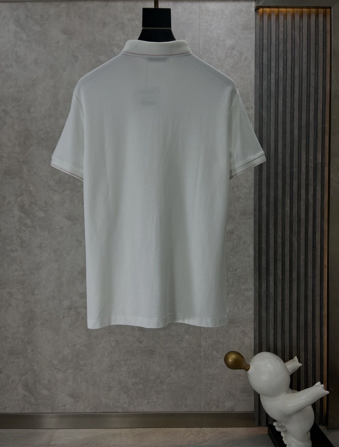 Koszulka polo Hermès z logo – nowy standard męskiego stylu