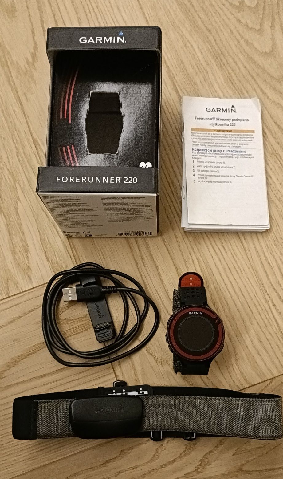 Zegarek biegowy GARMIN Forerunner 220 z oryginalną ładowarką USB