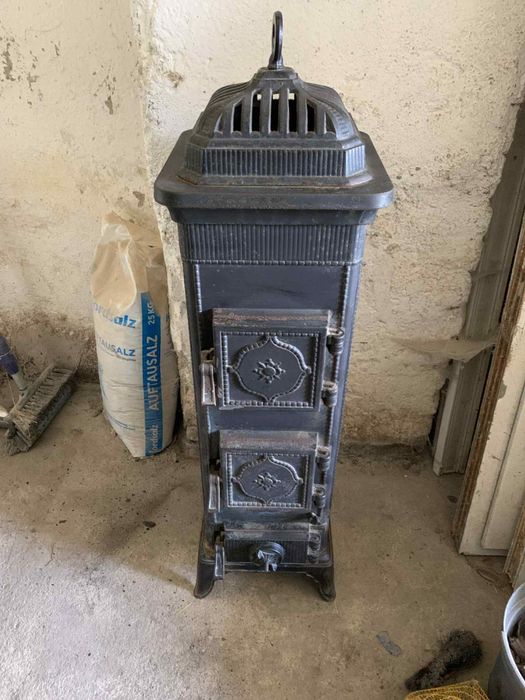 Ozdobny piecyk kominek zeliwny