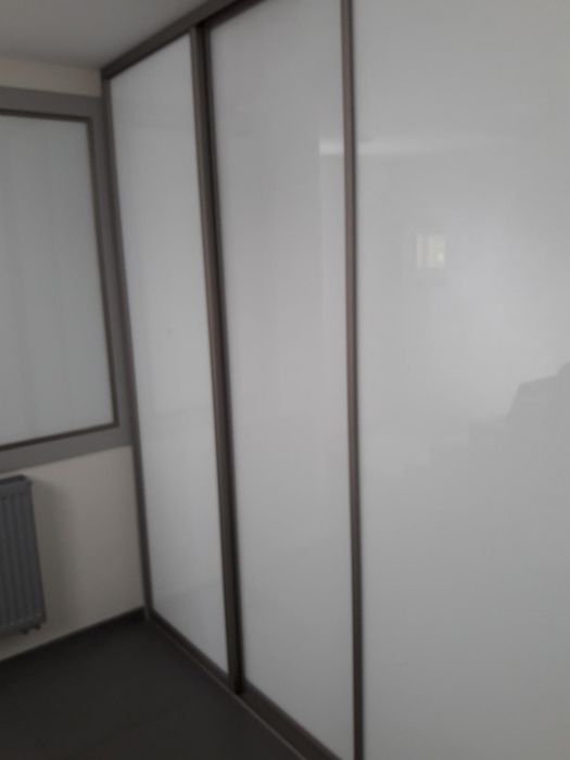 Drzwi aluminiowe w szkle lacobel przesuwne Indeco