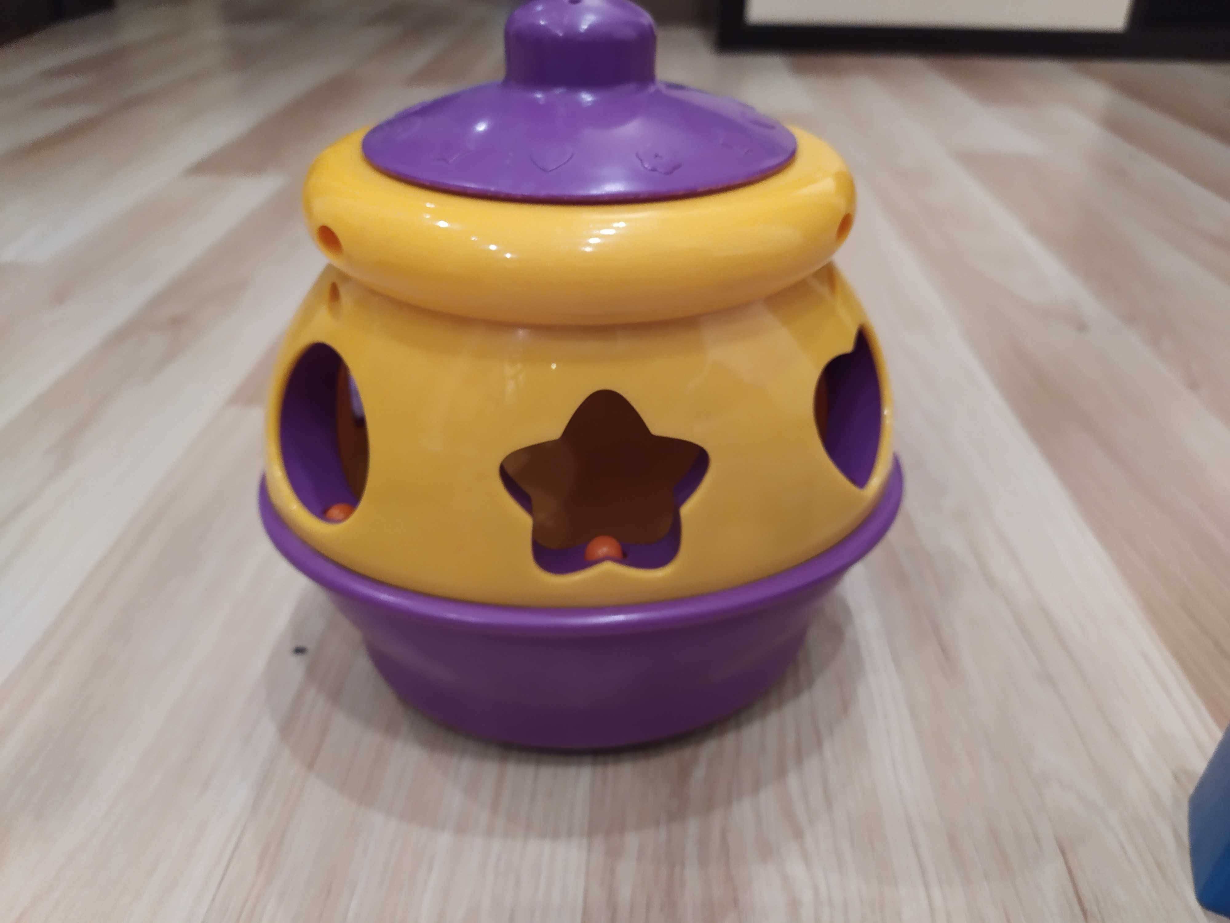 Garnuszek na klocuszek Fisher Price