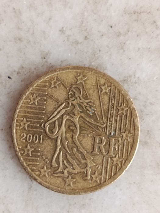 Moeda Francesa com defeitos