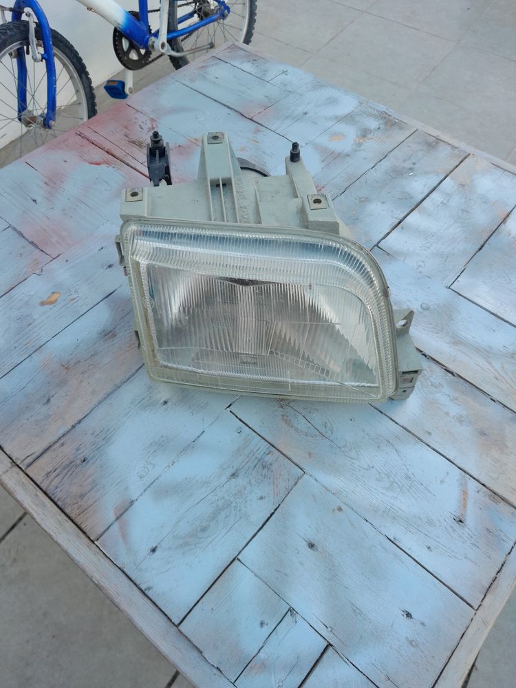 Farol renault clio