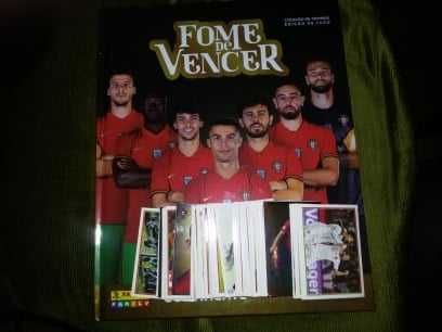 caderneta completa  com os cromos por colar  fome de vencer  2021