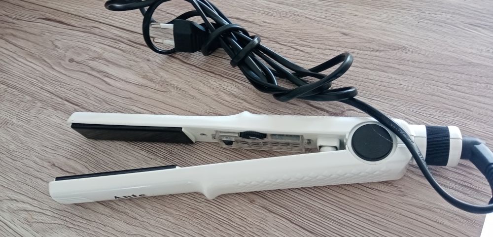 Prancha cabelo como Nova