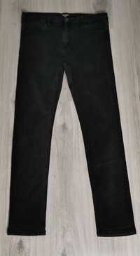 Spodnie jeansy Carhartt rozmiar 34/32 L/XL black czarne