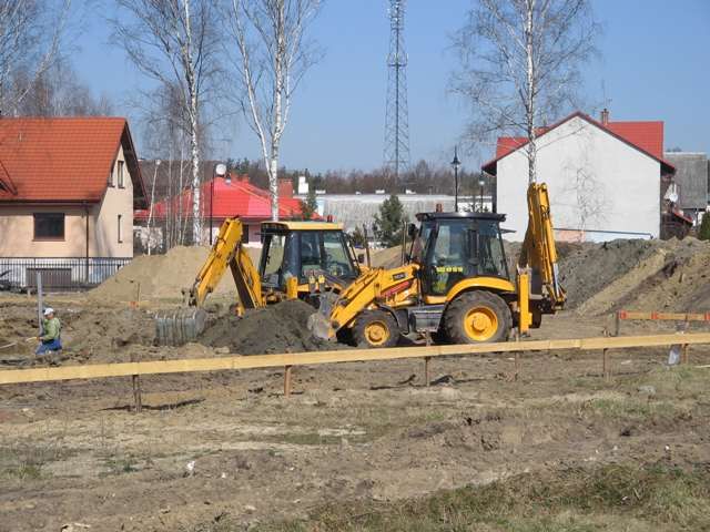 Koparko-ładowarka młot hydrauliczny kucie piasek żwir ziemia