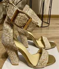 Nowe złote sandały na obcasie  damskie rozmiar 36