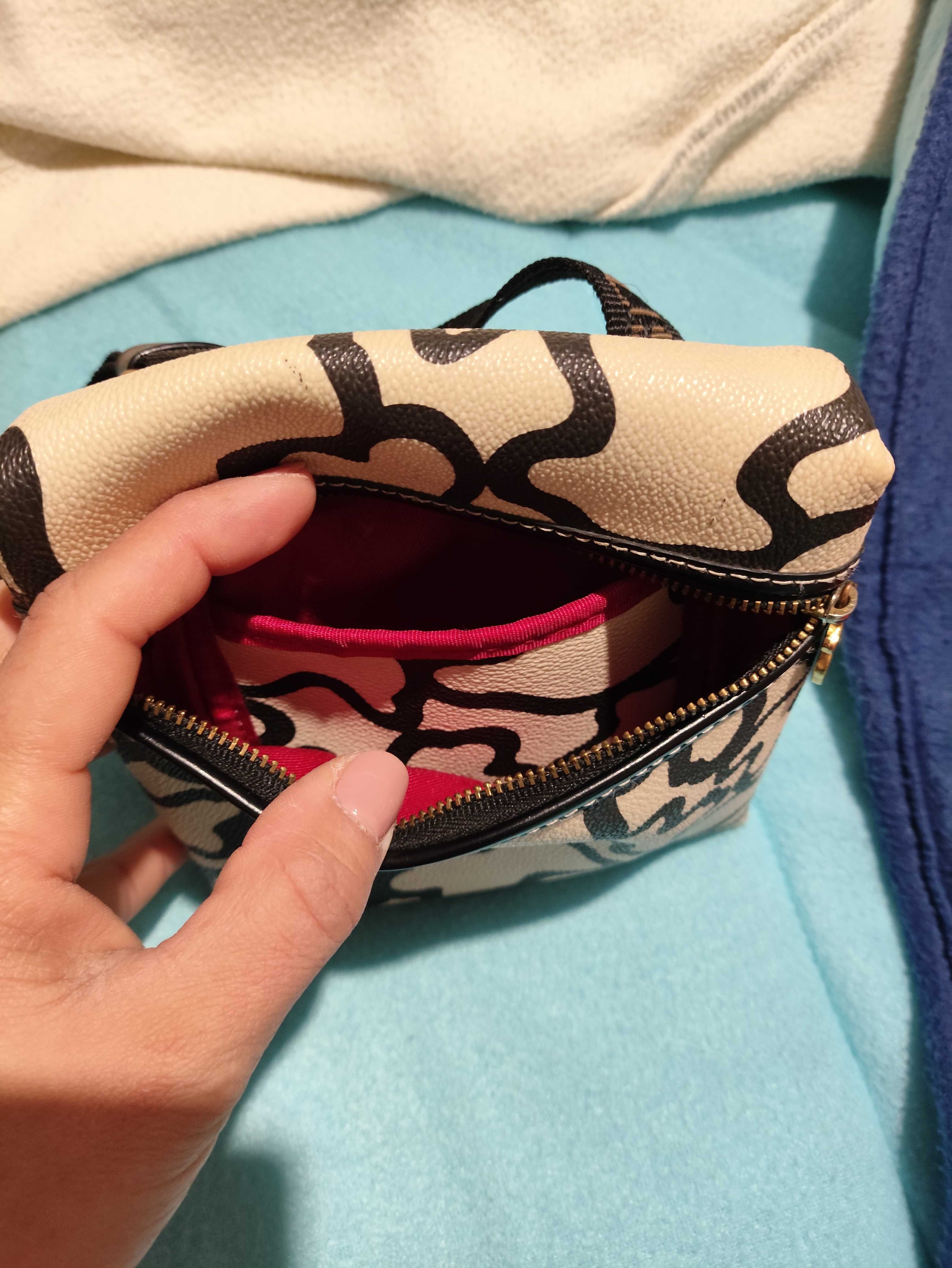 Malas originais Tous e Guess!